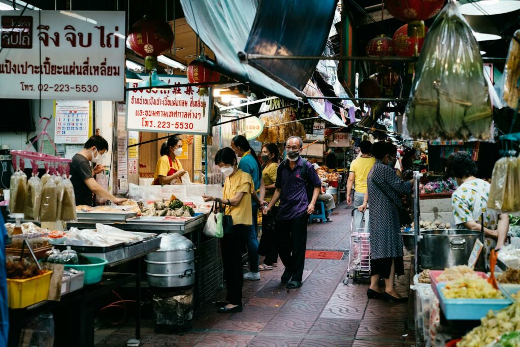 People Shopping on a Street Market in Thailand